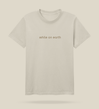 while on earth™ unisex tee